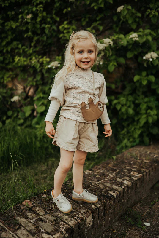 Girl wearing Niven Shorts in Soft Taupe colour by Donsje Amsterdan