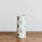 Noss medium sized vase featuring mint green spot pattern