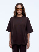 Front view of Sport Star Tee in washed cocoa showing oversized cut and crew neckline