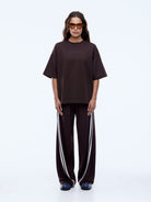 Full front view of Pelly Sport Star Tee in washed cocoa brown with relaxed oversized fit