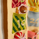 fabric details of Palmina Knitted Advent Calendar by Sage & Clare