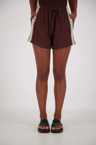 Brown shorts with white stripe by Jasmine Alexa