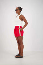 model wearing Panarea Shorts – Red by Jasmine Alexa