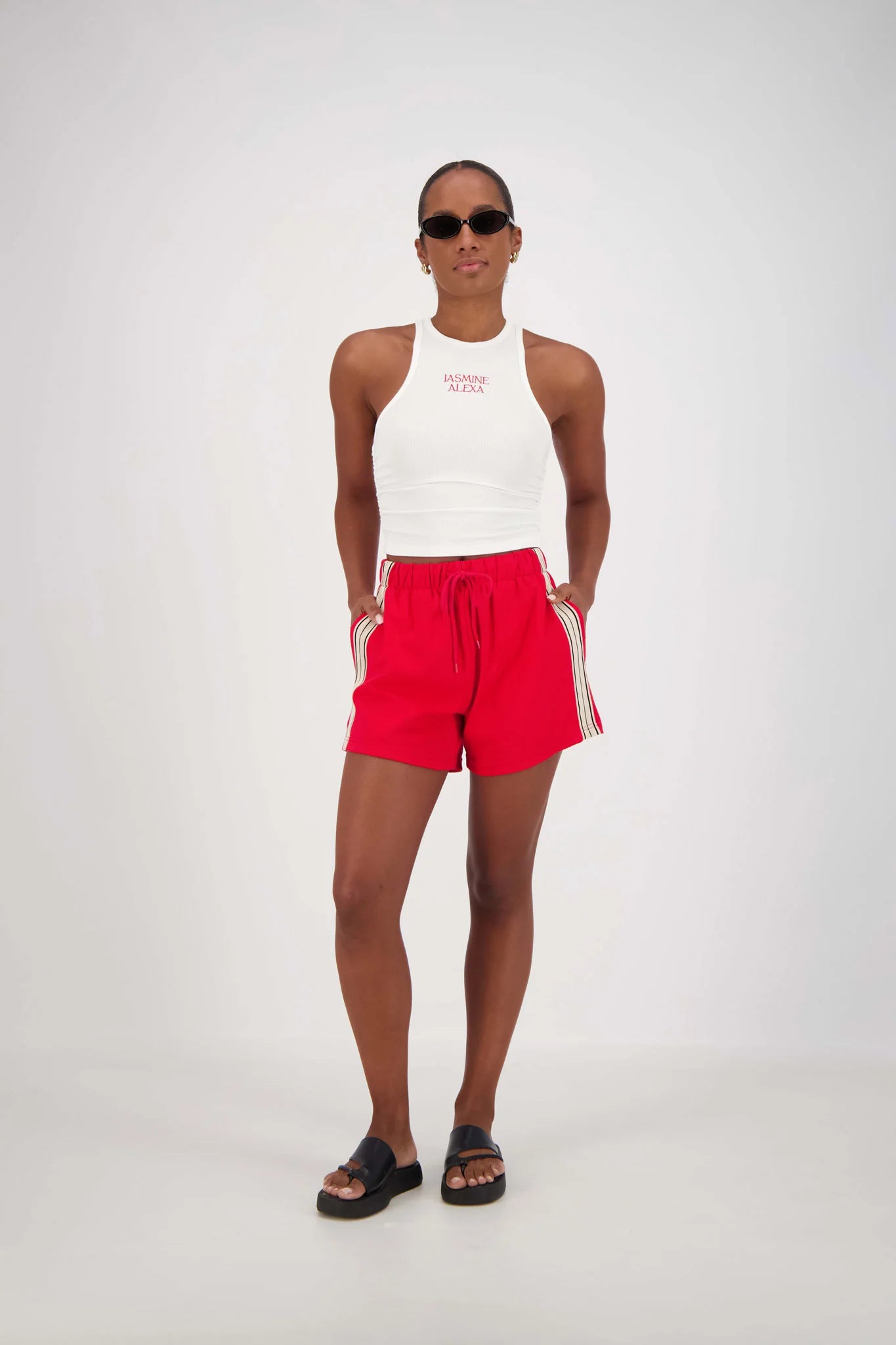 model wearing Panarea Shorts – Red by Jasmine Alexa