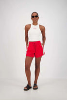 model wearing Panarea Shorts – Red by Jasmine Alexa
