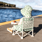 IZIMINI Parker baby chair v2 lifestyle shot showing toddler sitting comfortably outdoors