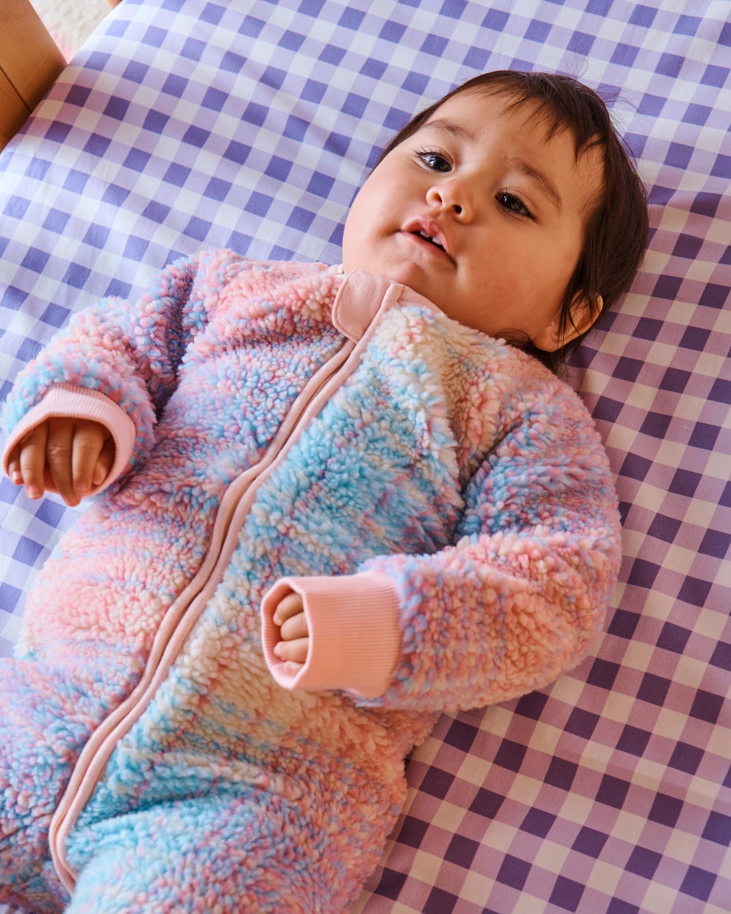 Baby wearing Pastel Dreams Tartan Sherpa Long Sleeve Romper by Kip & Co