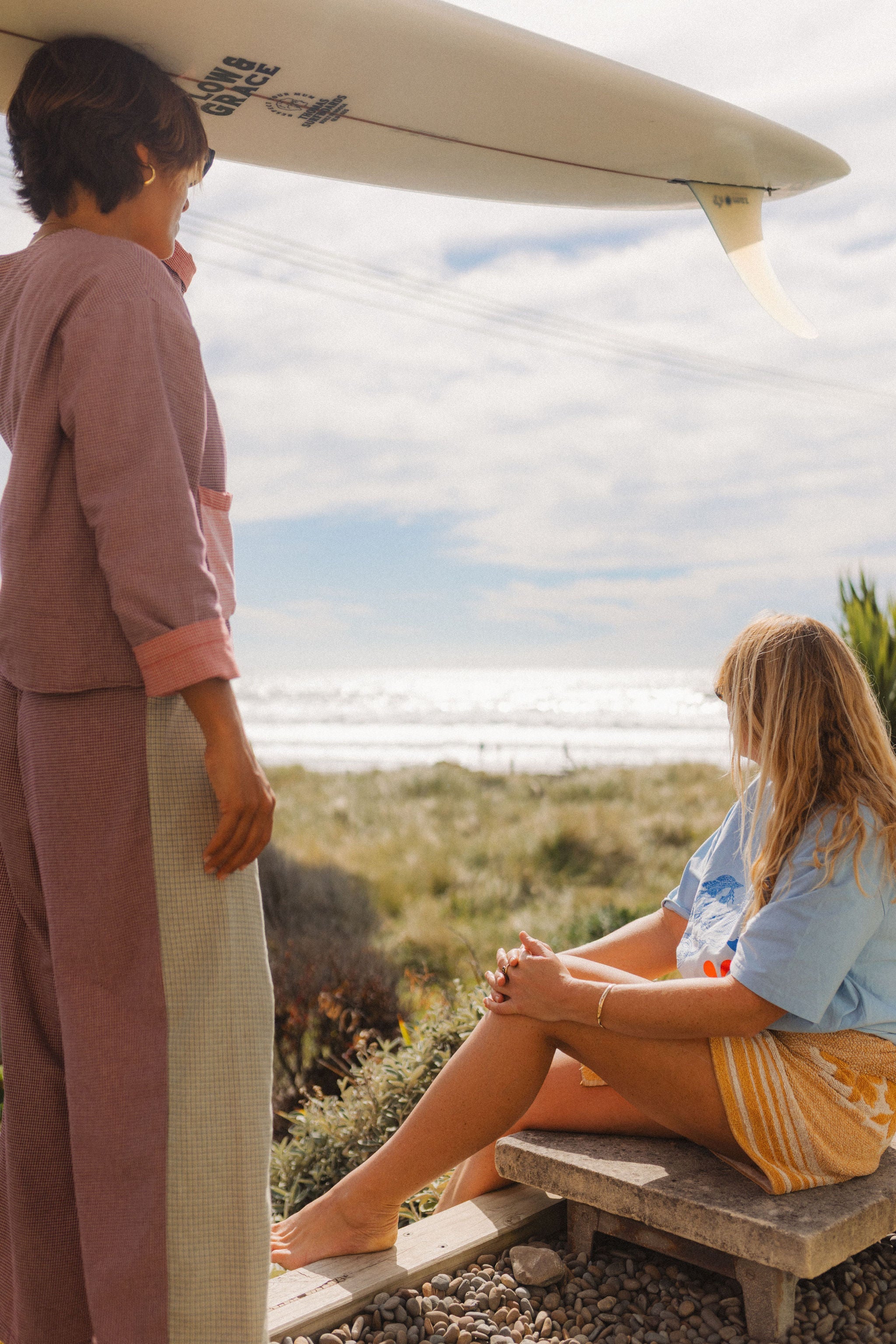 Beach group scene featuring woman in Atmosea Patchwork Pant Houndstooth Combo