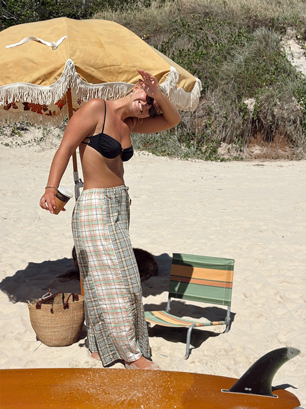 Lady on beach wearing Patchwork Pant in Cottage Plaid | Atmosea