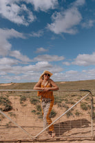 model wearing Patchwork Singlet by Atmosea – Ginger Gingham