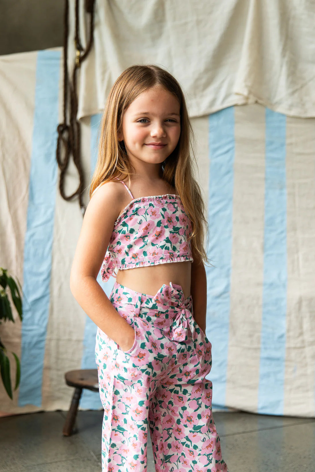 girl wearing Penny Top – Sakura by Pearson & Pearson with pink and green flowers