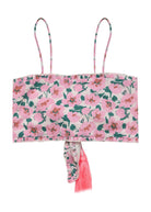 Girls wrap top in pink and green floral design with bright pink tassles. Penny Top – Sakura by Pearson & Pearson