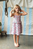 girls pink and green floral dress with bright pink tassels by Bella & Lace - Pepper Dress – Sakura 