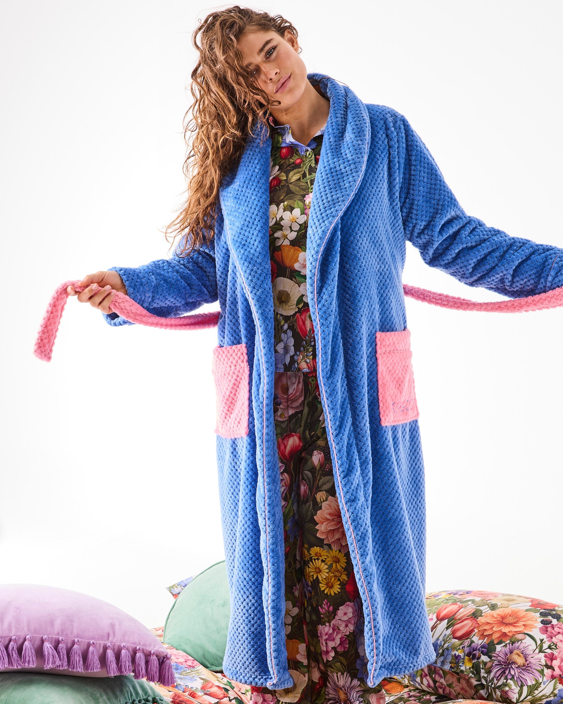 Front view of Kip & Co Pie In The Sky blue waffle textured robe with pink pockets and tie belt