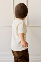 Back view of boy in Pima Cotton Eddie Tee - Cloud | Jamie Kay