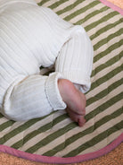 baby crawling on  Pistachio Seersucker Playmat by Mosey Me 