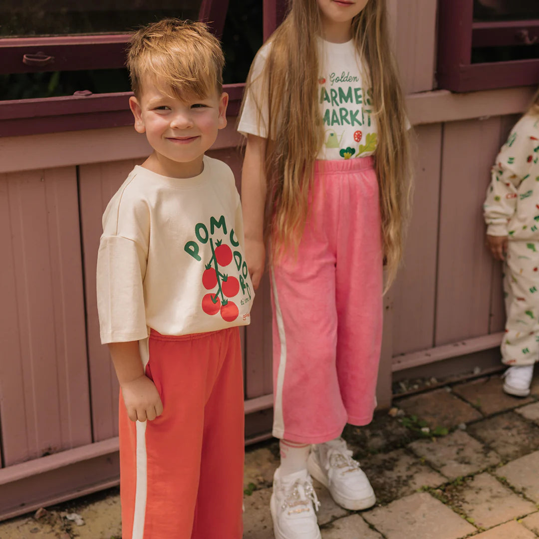 two kids wearing clothing by Golden Children
