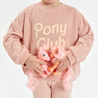 Pony Club Leggings Golden Children in Misty Rose Pink colour worn by girl holding two my little pony horses