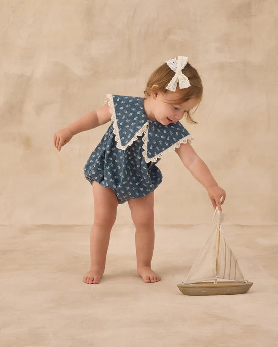 girl wearing Porter Romper Ditsy by Rylee & Cru