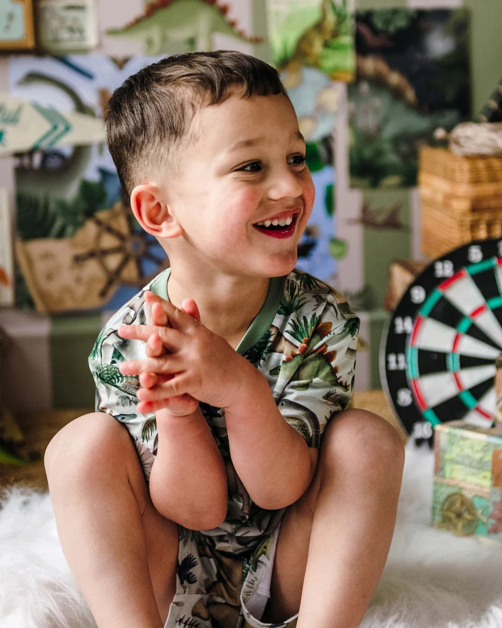 boy wearing 'Prehistorica' Tavi Sleep Set in Olive Leaf | Fleur Harris