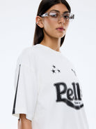 Racing Pelly Swoop Vintage White T-shirt by Ena Pelly oversized cotton graphic tee with sleeve stripes