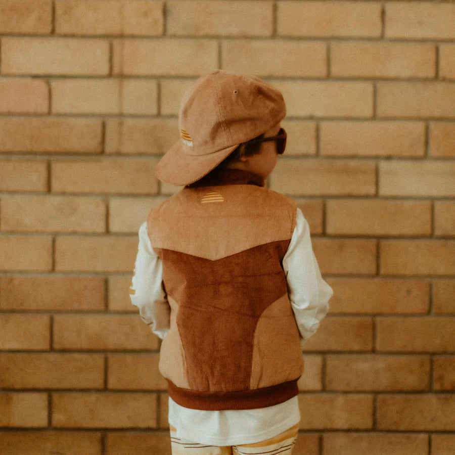 Child wearing Retro Spliced Puff Cord Vest by Banabae showing back details