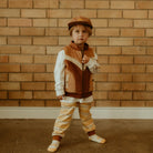 Child wearing Banabae clothing including the Retro Spliced Puff Cord Vest