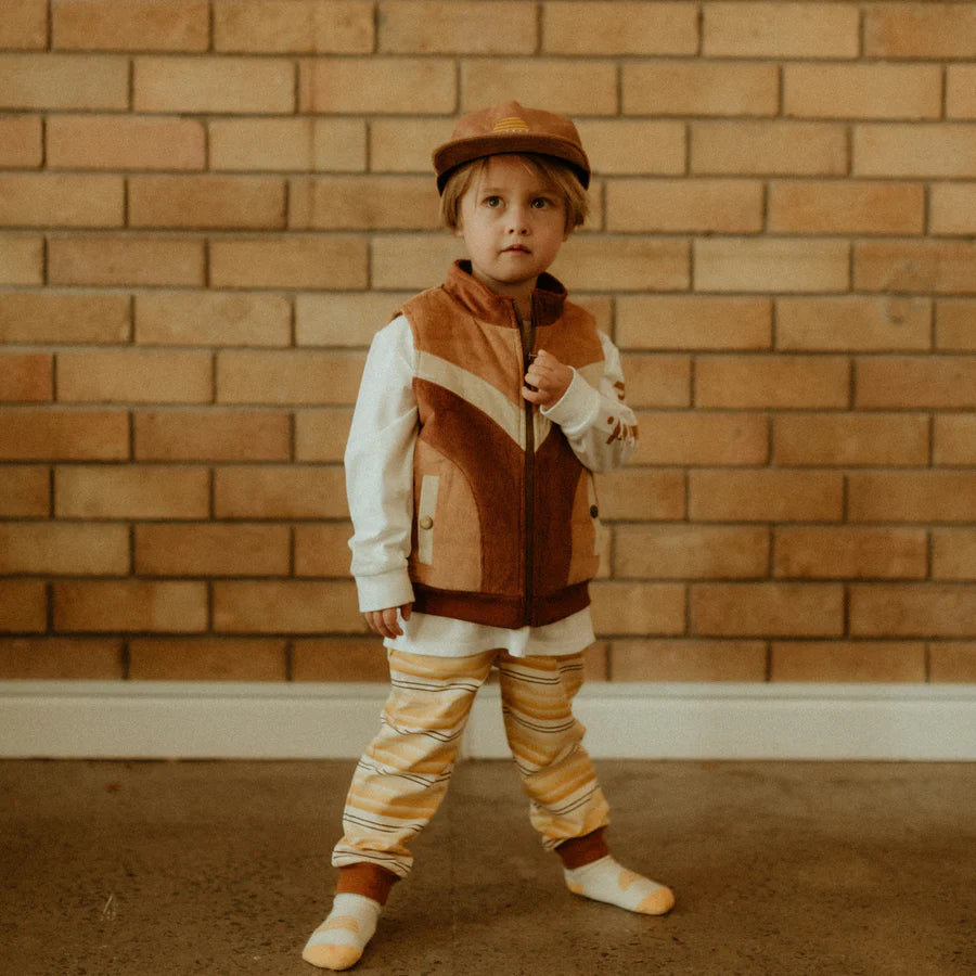 Child wearing Banabae clothing including the Retro Spliced Puff Cord Vest