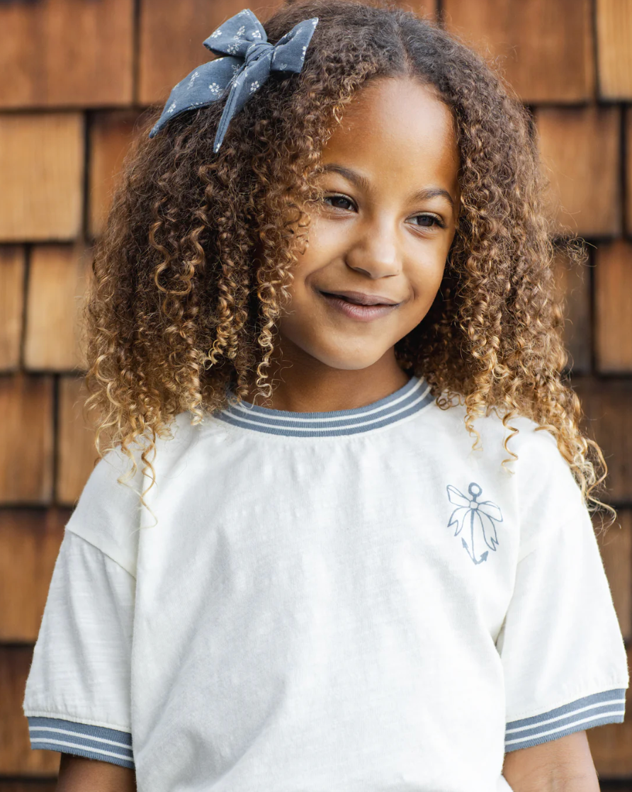 Young girl in the Ringer Tee Anchor Bow | Rylee + Cru