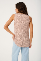 Back view of Rita Cami displaying ocelot print pattern and sleeveless silhouette