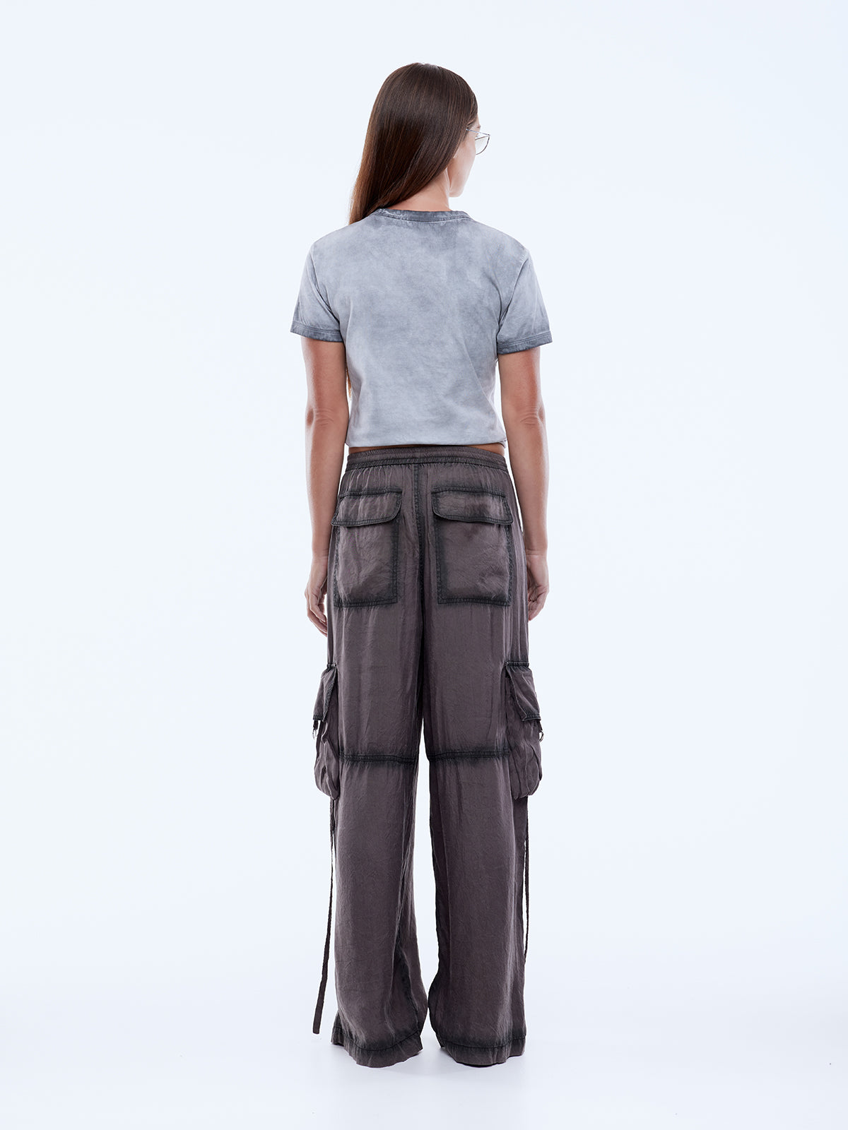 back view showcasing relaxed fit and inseam pockets of Stardust cargo pants