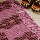 Sawa cotton bath mat with fringing