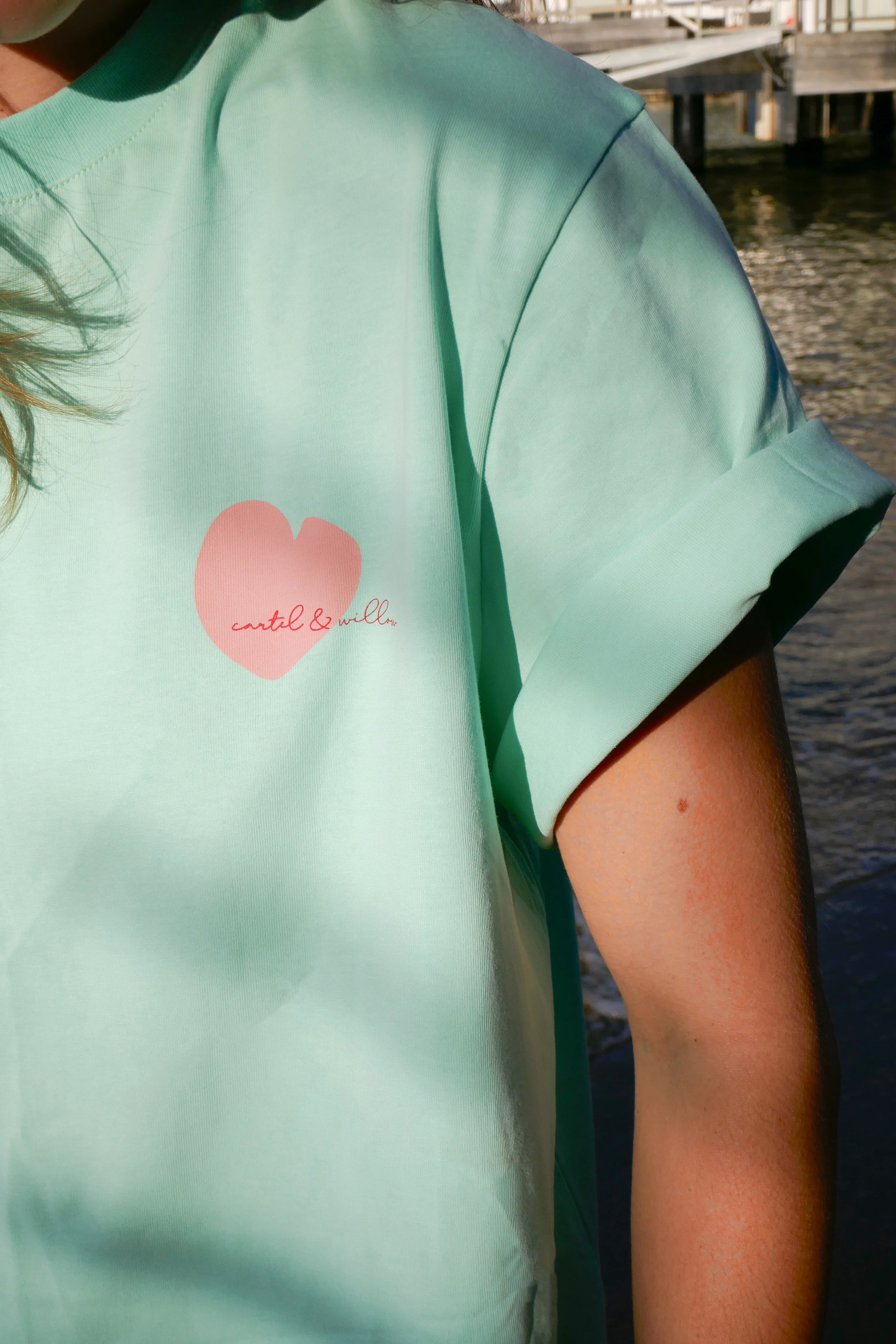 Sleeve details of Self Love Club Tshirt by Cartel and Willow Mint / Pink