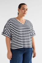 model wearing Seter Tee Black and White Stripped by ELK