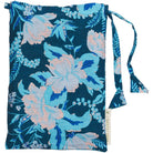 Teal linen storage bag with blue and blush pink floral print and fabric tie closure