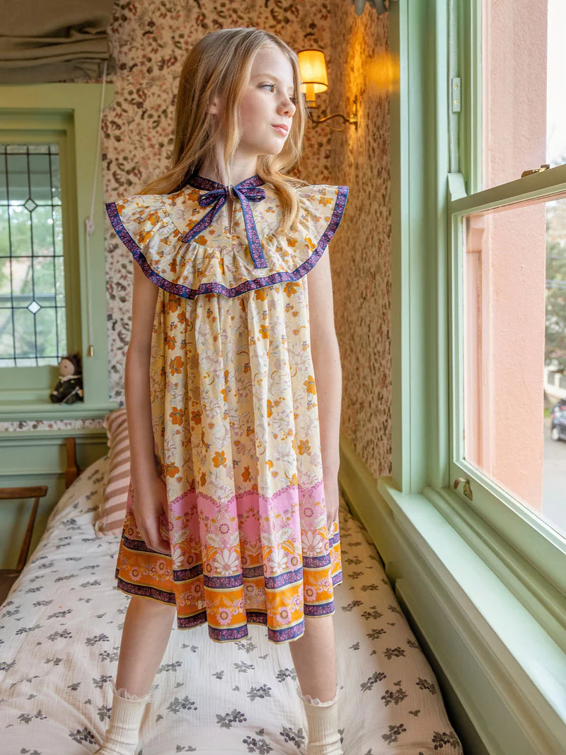 Somerset Dress by Tutu Du Monde with bow and playful neckline detailing