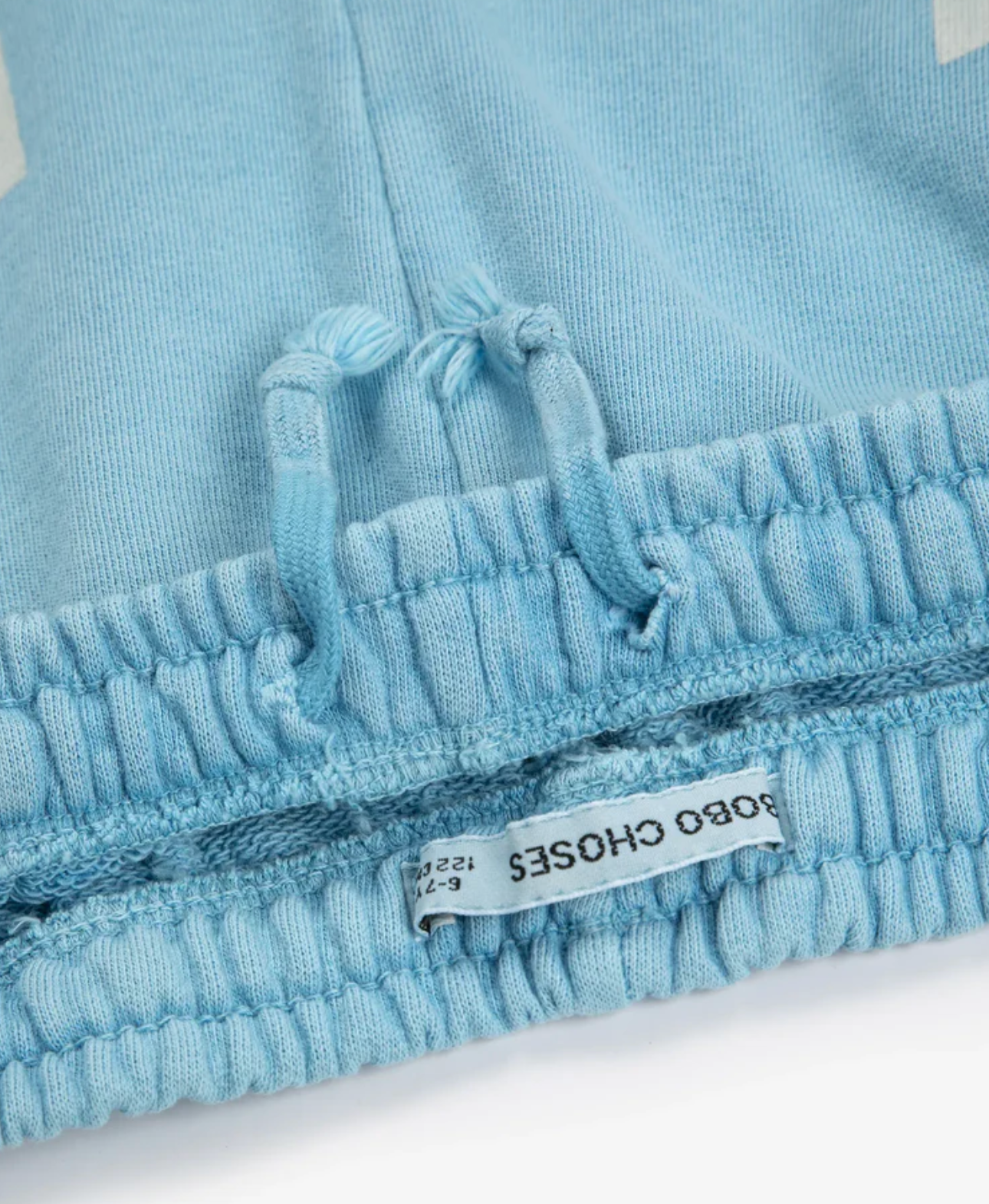 Close up of waistband on the Square Bobo Choses Bermuda Shorts - Light Blue | Bobo Choses