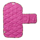 Top view of pink Stela Change Mat displaying quilted diamond pattern and colorful plaid binding trim