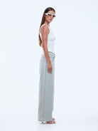 womens light wash jeans with stud detailing down the side