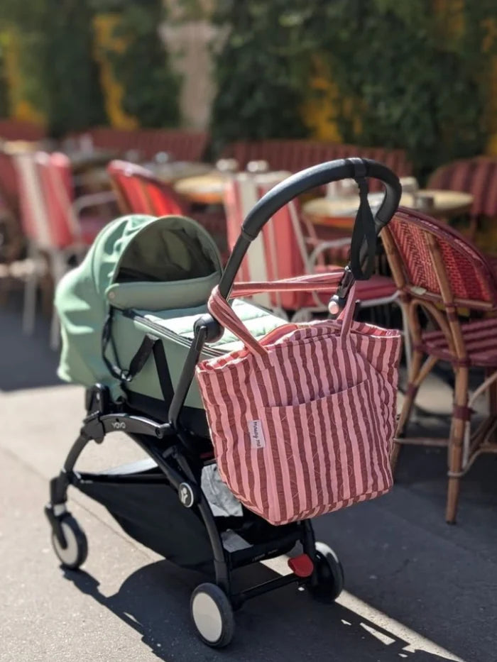 pink and red quilted baby bag