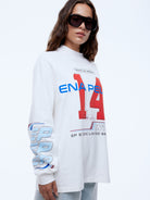 Woman wearing Ena Pelly Team Pelly oversized long sleeve tee lifestyle street style outfit inspiration