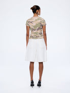womens shirt with desert camouflage pattern and Ena Pelly branded badge detail on baby tee