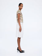 Model wearing Ena Pelly Tessa Baby Tee showing fitted crop silhouette and crew neckline