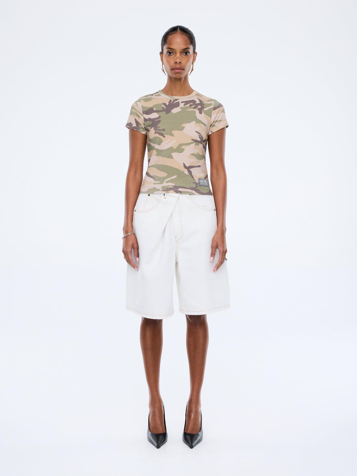 Front view of Ena Pelly Tessa Baby Tee showing cap sleeve design and cropped fit