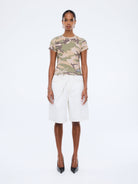 Front view of Ena Pelly Tessa Baby Tee showing cap sleeve design and cropped fit