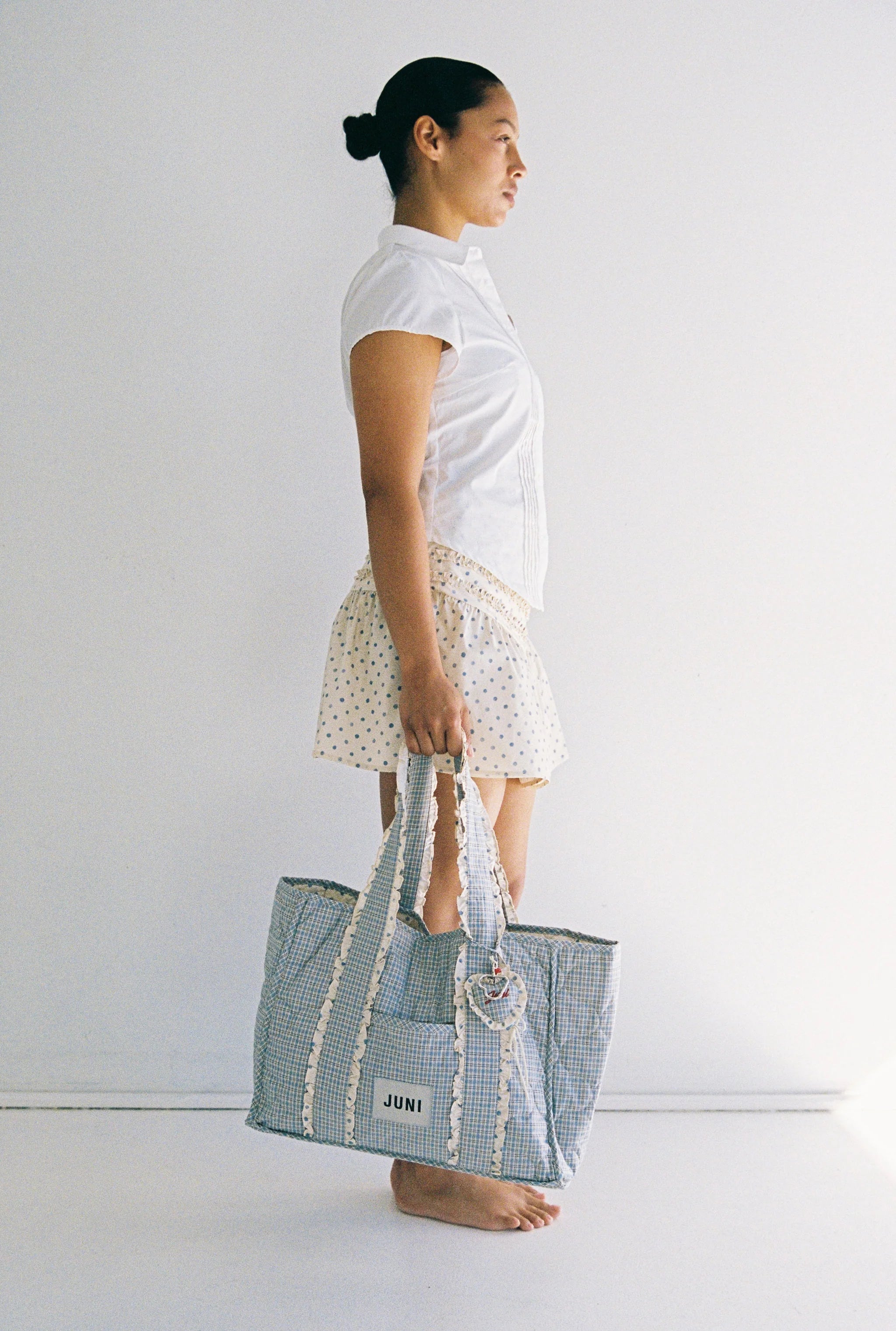 women holding The Everything Bag - Blue Check - Juni