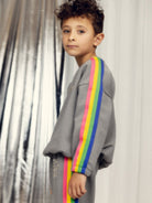 boy wearing The Milky Way Rainbow Panel Sweatshirt – Grey by Mini Rodini
