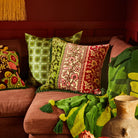 green, pink and red velvet floral cushion by Sage & Clare