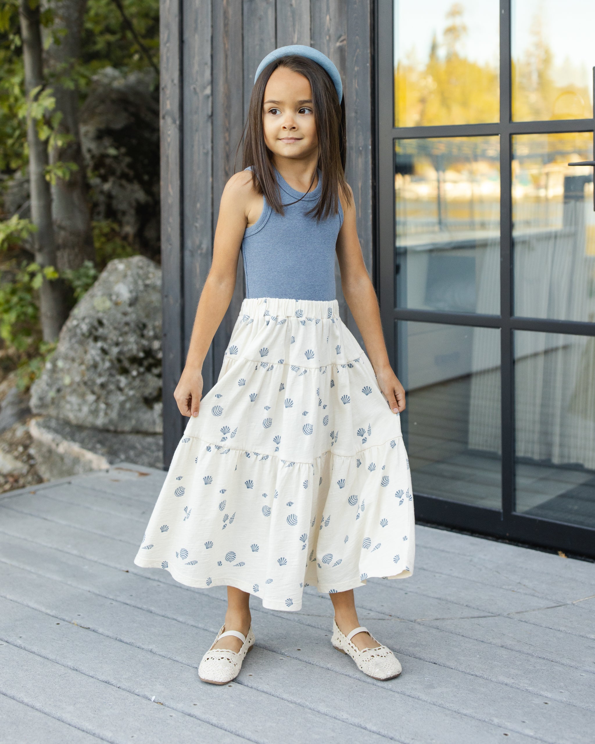 Young girl wearing the Tiered Midi Skirt Seashells | Rylee +Cru