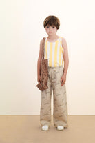 Boy wearing Tiny & Tiny Twill Pant – Dark Vanilla by Tiny Cottons